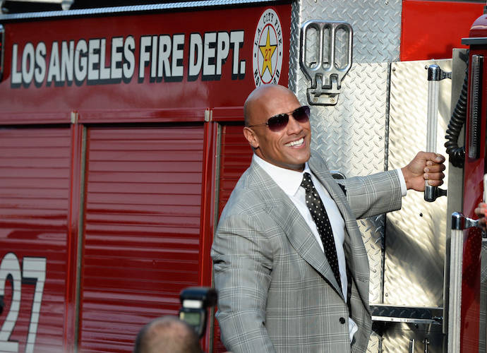 Dwayne ‘The Rock’ Johnson Poses On A Firetruck At ‘San Andreas’ Premiere