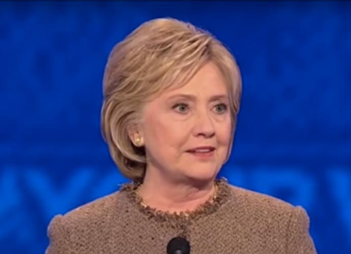 Hillary Clinton’s Bathroom Break Causes Late Return To The Democratic Debate – Again!