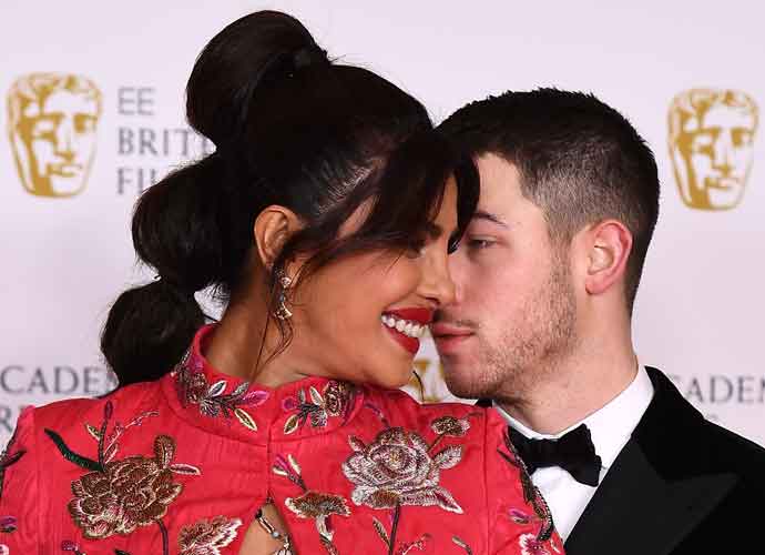 Priyanka Chopra Snuggles Up To Nick Jonas On The BAFTA’s Red Carpet