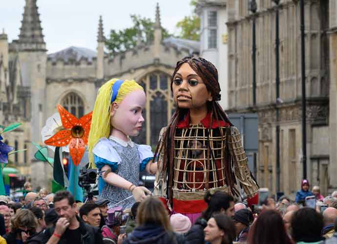 Little Amal Puppet Meets Alice During 5,000 Mile Journey From Turkey To Manchester