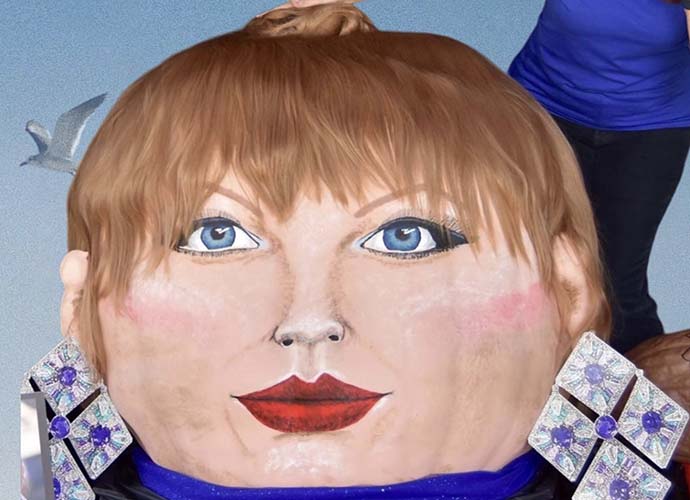 Artist Paints Taylor Swift’s Face On 399-Pound Pumpkin With Sweet Potatoes For Ears