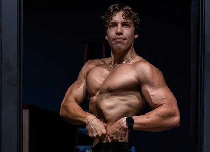 Arnold Schwarzenegger’s Son, Joseph Baena,  Recreates His Father’s Classic Weightlifting Pose