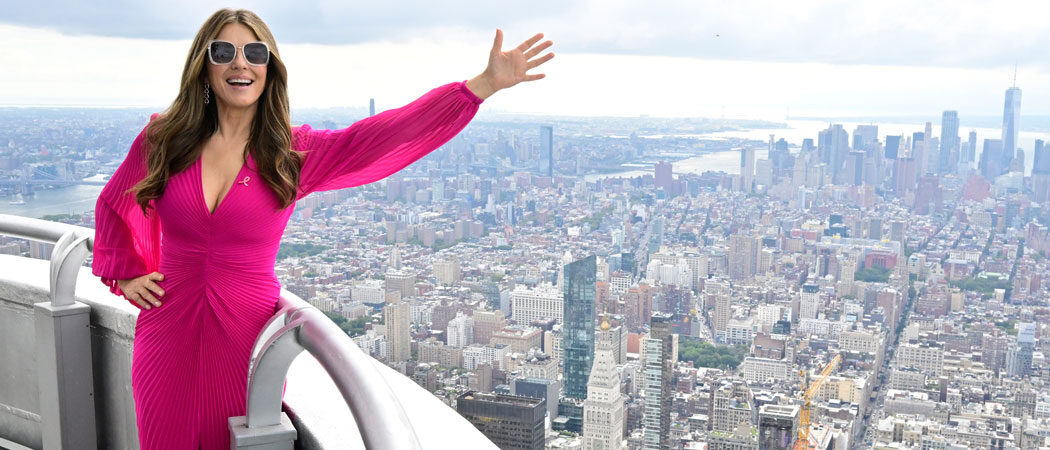 Elizabeth Hurley Dons Pink On Top Of The Empire State Building In Honor Of Breast Cancer Awareness Month