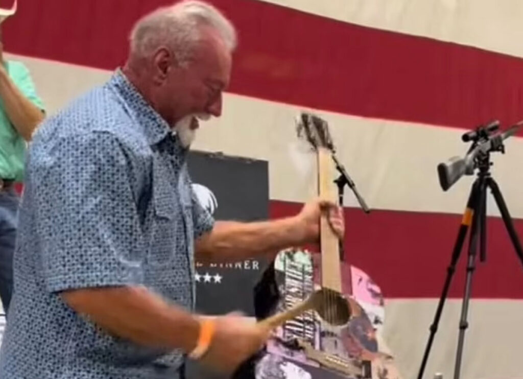 Texas Man Smashes A Taylor Swift-Signed Guitar With A Hammer After Paying $4000 For It At An Auction As ‘A Joke’