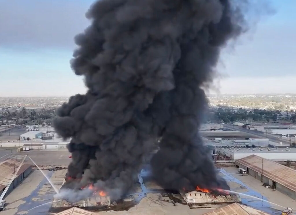 VIDEO: Drone View Shows Thick Black Smoke Rise During Warehouse Fire In Bakersfield