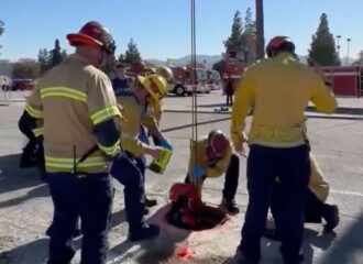 VIDEO: Firefighters Rescue Woman Who Fell 15 Feet Into A Manhole & Trapped Overnight Underground