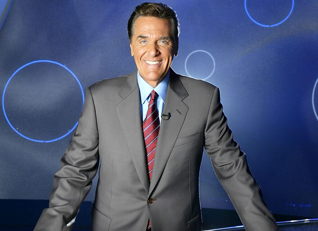 Chuck Woolery, Host of ‘Love Connection’ & ‘Wheel of Fortune,’ Dies At 83