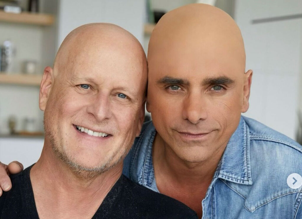 John Stamos Faces Backlash After Wearing Bald Cap To Support ‘Full House’ Costar Dave Coulier After Cancer Diagnosis