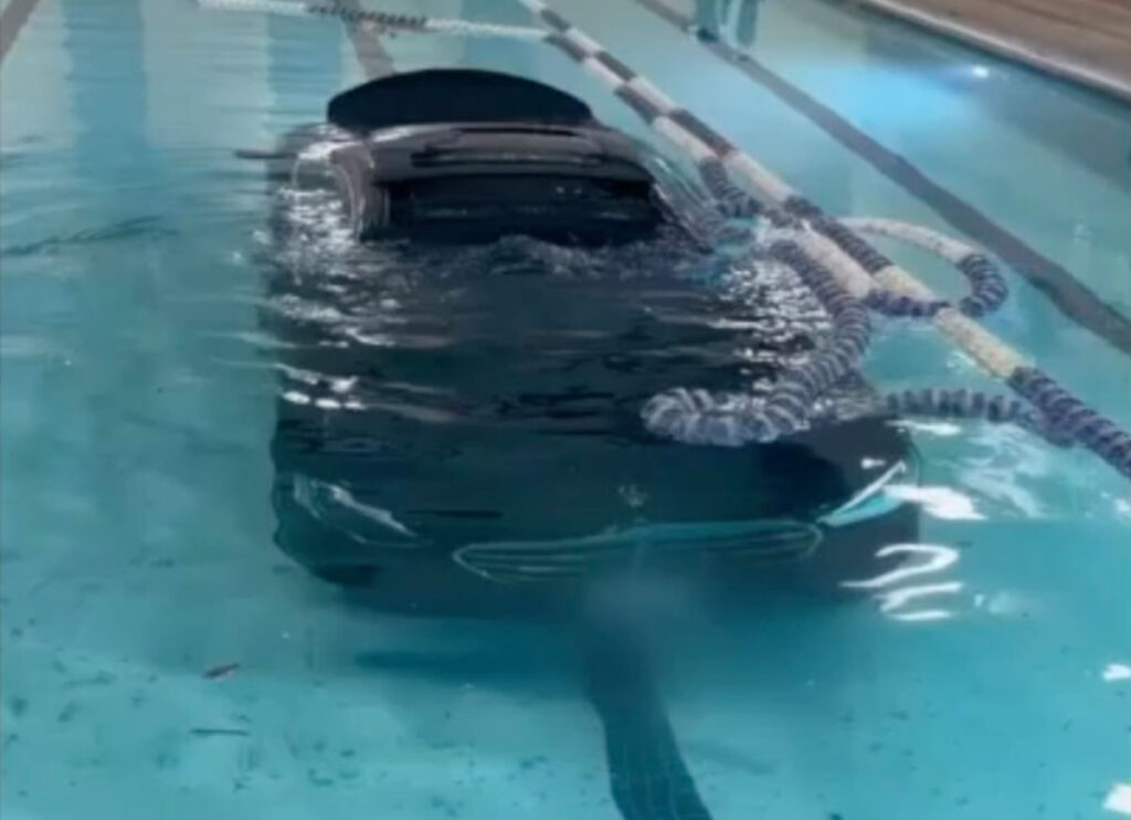 VIDEO: Firefighters Remove Car From Pool After Vehicle Crashes Into Gym