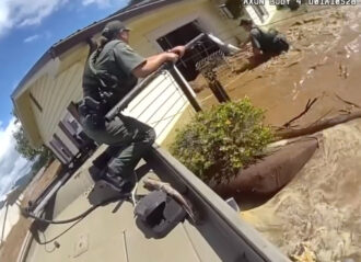 VIDEO: Newly Released Bodycam Footage Shows Dramatic Rescues Of People On Rooftops & Trees Amid Hurricane Helene