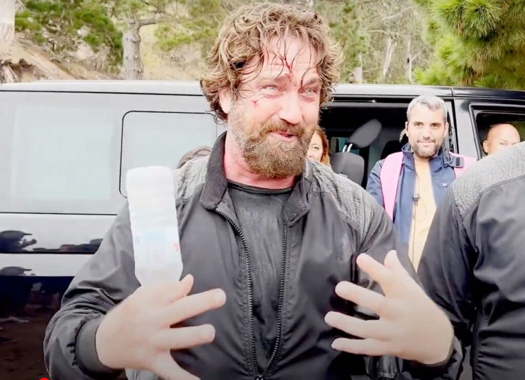 BTS VIDEO: Gerard Butler Breaks Down During His Wrap Speech For ‘Den Of Thieves 2’