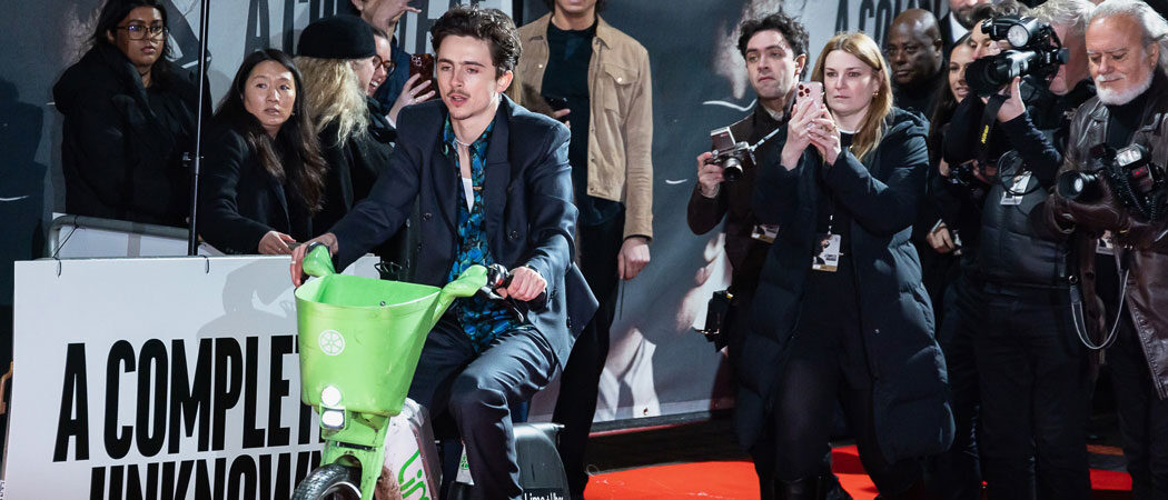 Timothée Chalamet Rides An E-Bike To ‘A Complete Unknown’ London Premiere