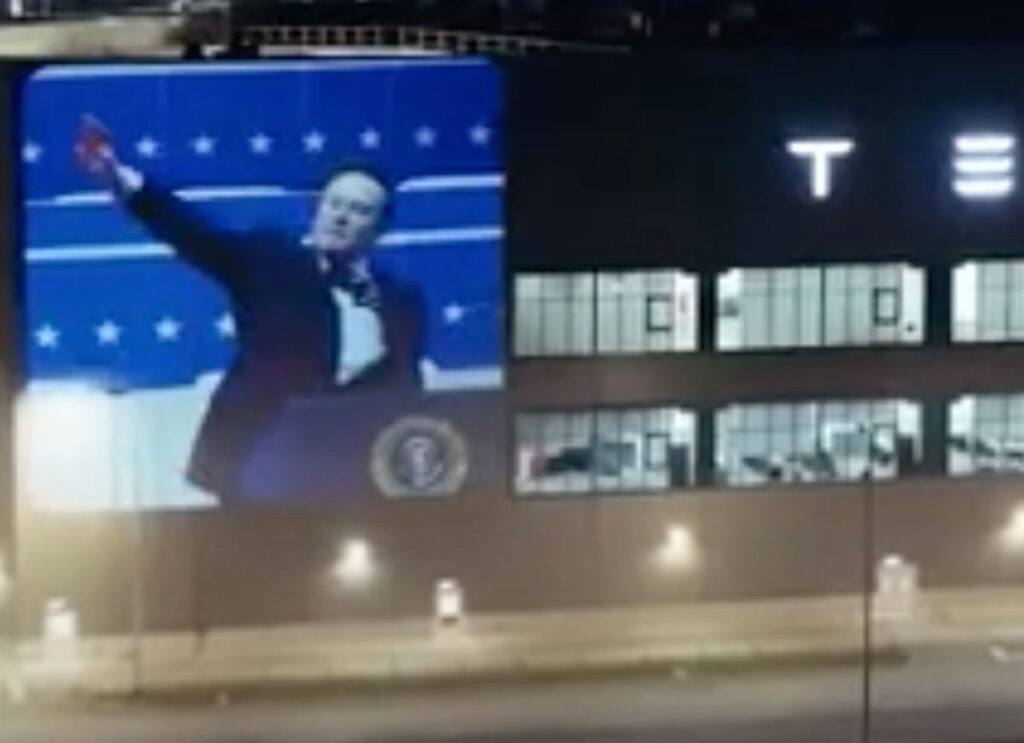 VIDEO: Elon Musk’s Straight-Arm Salute Projected Onto Carmaker’s Berlin Gigafactory: ‘Heil Tesla!’