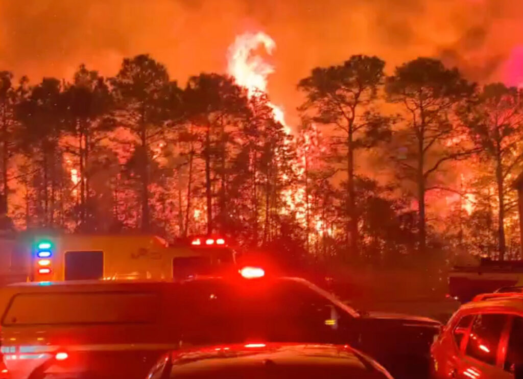 VIDEO: Wall Of Fire Bears Down on Homes As Raging Inferno Turns Sky Orange In South Carolina