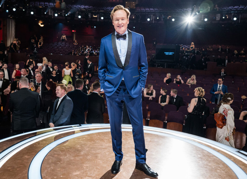 Conan O’Brien’s Oscars Joke About ‘Standing Up To A Russian’ Sparks Applause After Zelensky’s Oval Office Smakdown