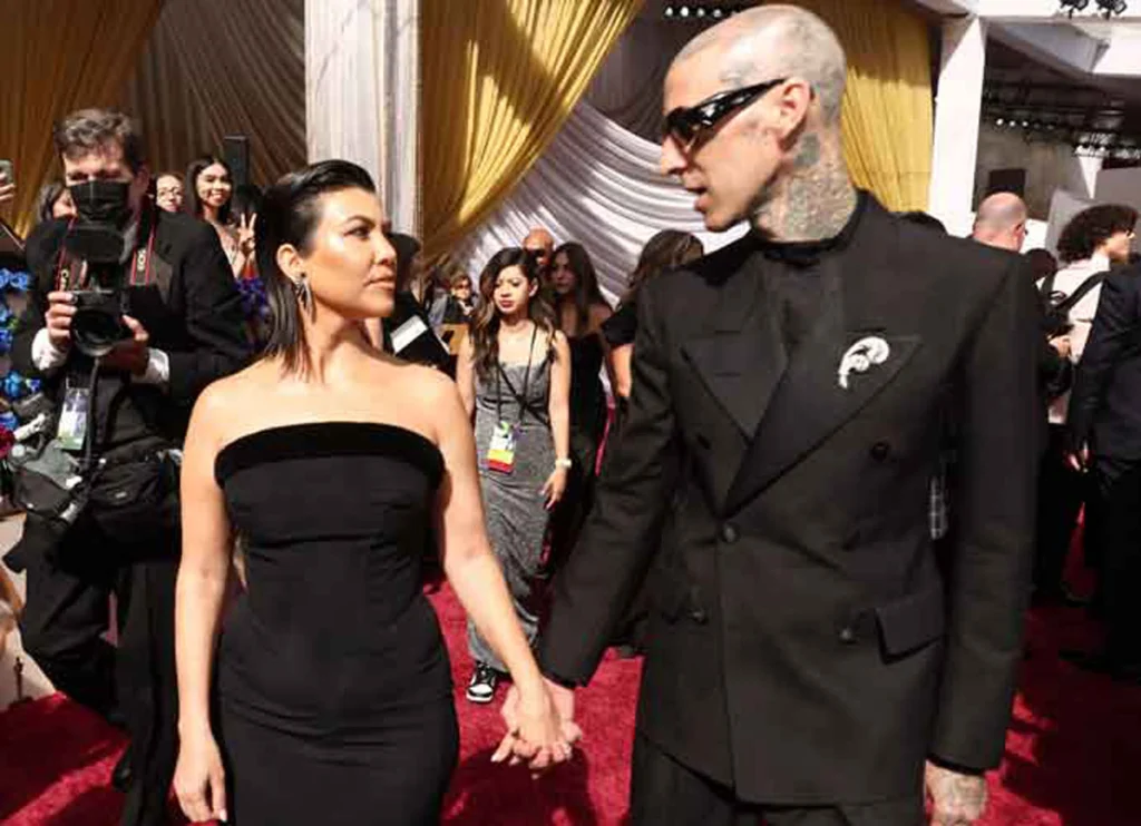 Kourtney Kardashian & Travis Barker Booed At WWE Event