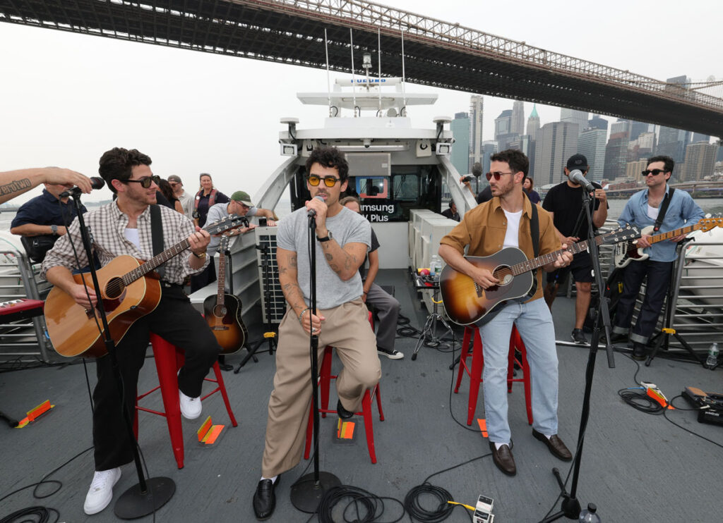 Jonas Brothers Shock Fans With Surprise Performance On NYC Ferry Ahead Of Album Release