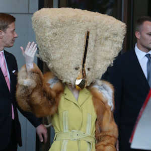 Lady Gaga Wears Tan Fur Headdress Leaving Berlin’s Ritz Carlton