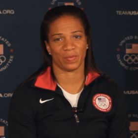 EXCLUSIVE: U.S. Paralympic Runner April Holmes On Sharing Gold With Fellow Americans
