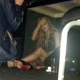 Lindsay Lohan Hides Under A Table At Brazilian Nightclub