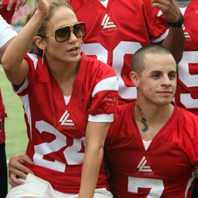 Jennifer Lopez And Casper Smart Cuddle At Charity Football Game